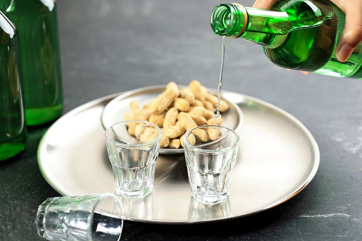 Traditional Korean soju poured into a small shot glass