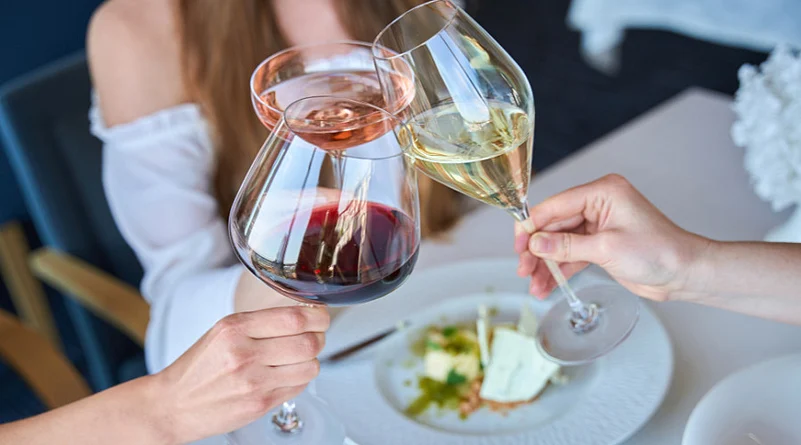 Yes, this summer, we’re sipping wine without a setting that suits it