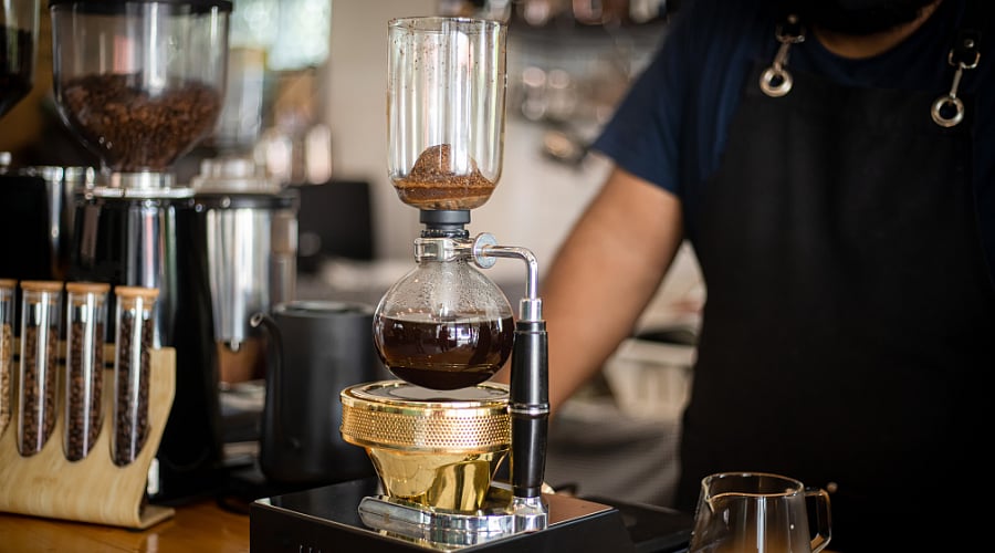 The siphon method of brewing coffee gives a well-balanced cup of coffee.