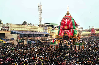 Shutterstock : The crowd of devotees gathered on the streets of Puri to celebrate the Jagannath Rath Yatra