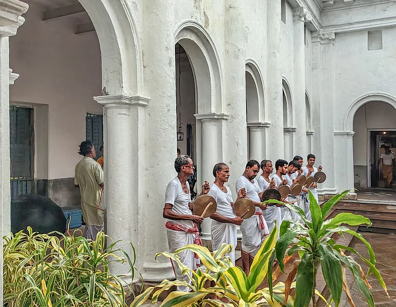 The celebration in full devotion fervour, inside the sanctum of the temple