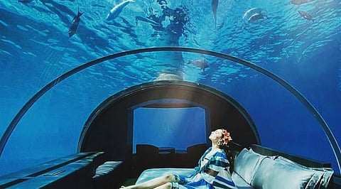 The Muraka reimagines luxury with an underwater bedroom enclosed by a curved acrylic dome, offering uninterrupted views of the Indian Ocean's marine life.