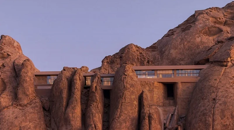 Carved into ancient granite cliffs, Desert Rock Resort merges seamlessly with Saudi Arabias dramatic desert landscape through its understated architectural design.