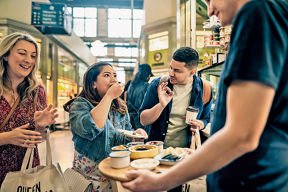 Try great coffee and local delicacies at Melbournes Queen Victoria Market 