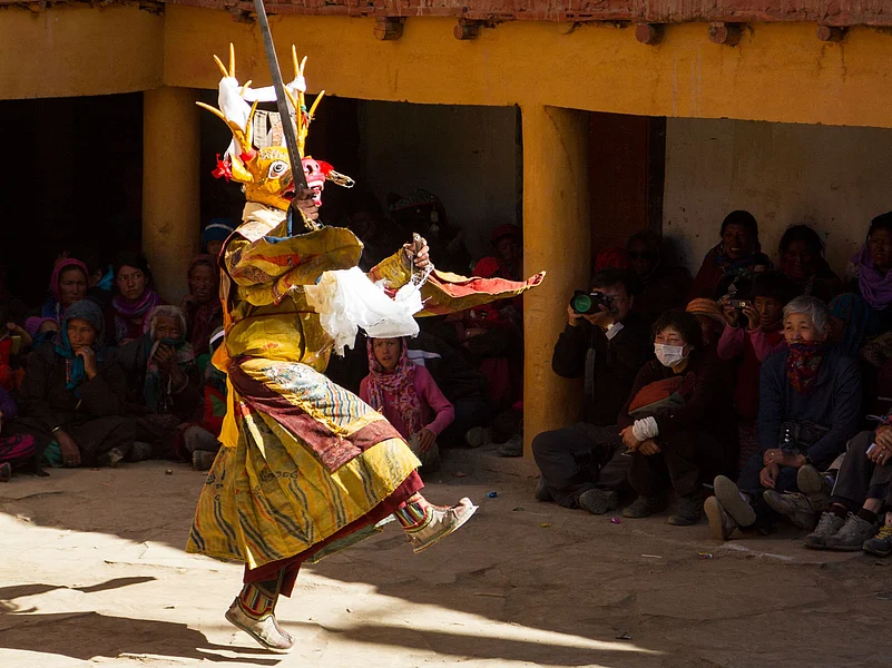 A person performs a traditional dance in Korzok