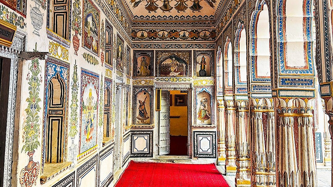 Colourful frescoes adorn a historic Shekhawati haveli