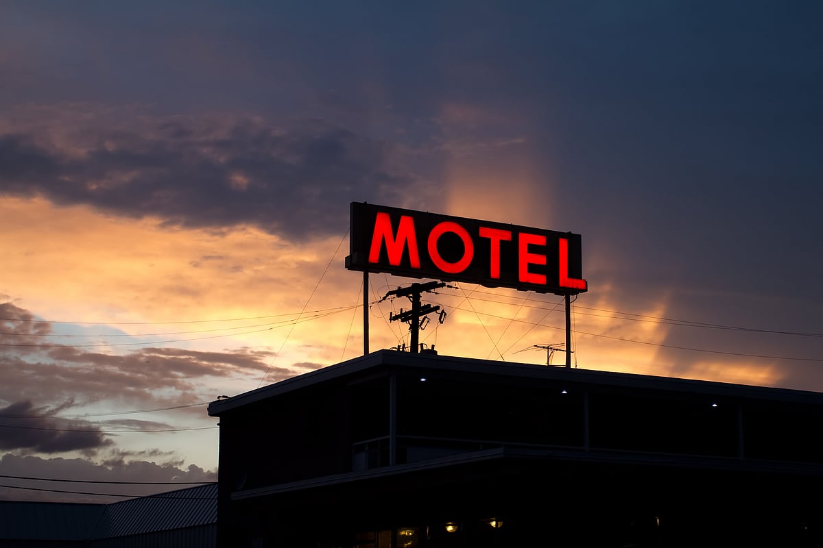 Retro motel sign at sunset in Denver (For Representational Use only)