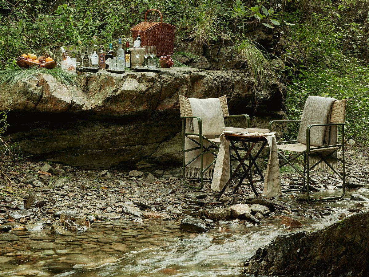 A streamside picnic setup near the retreat
