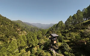 The Sen : The S-Suite rises above the pine-covered hillside at The Sen