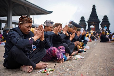 A Tenggerese Hindu devotee praying at Bromo