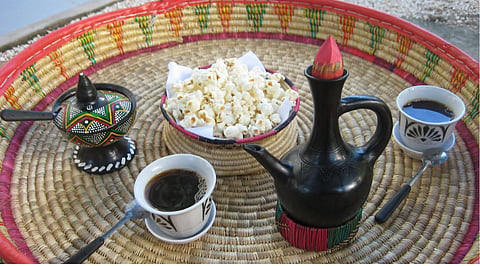 The jabena, or the clay pot along with coffee and popcorn