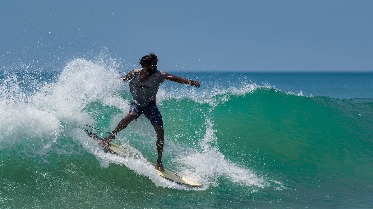Wirestock Creators/Shutterstock : Surfing in Varkala, Kerala