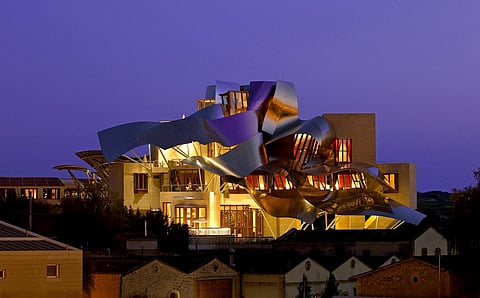 Frank Gehry brings sculptural forms and colourful titanium to Rioja wine country.
