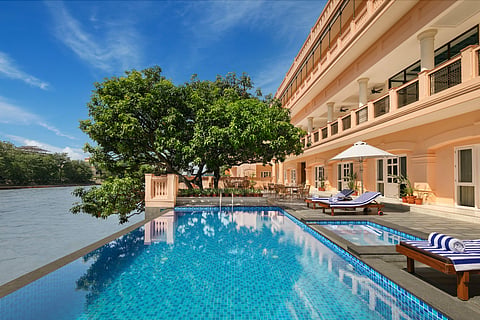 Pilibhit House is a restored century-old mansion with 35 rooms and suites, a private ghat, wellness experiences, and riverside dining