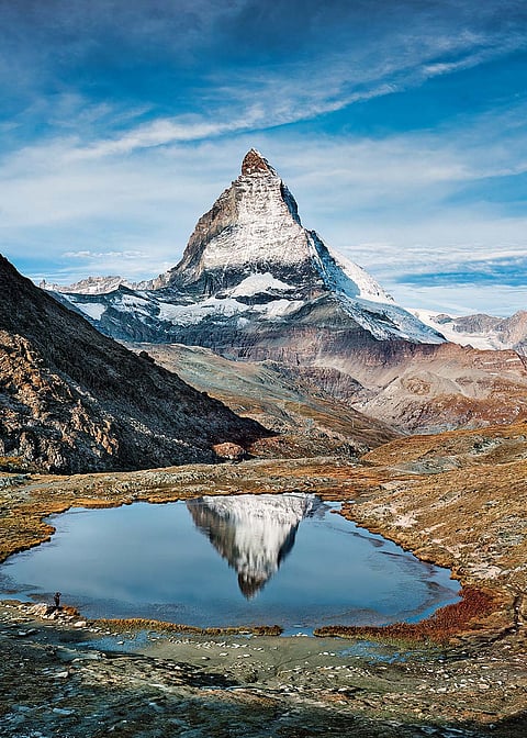 Riffelsee Lake, at 2,757 m, offers a striking reflection of the Matterhorn