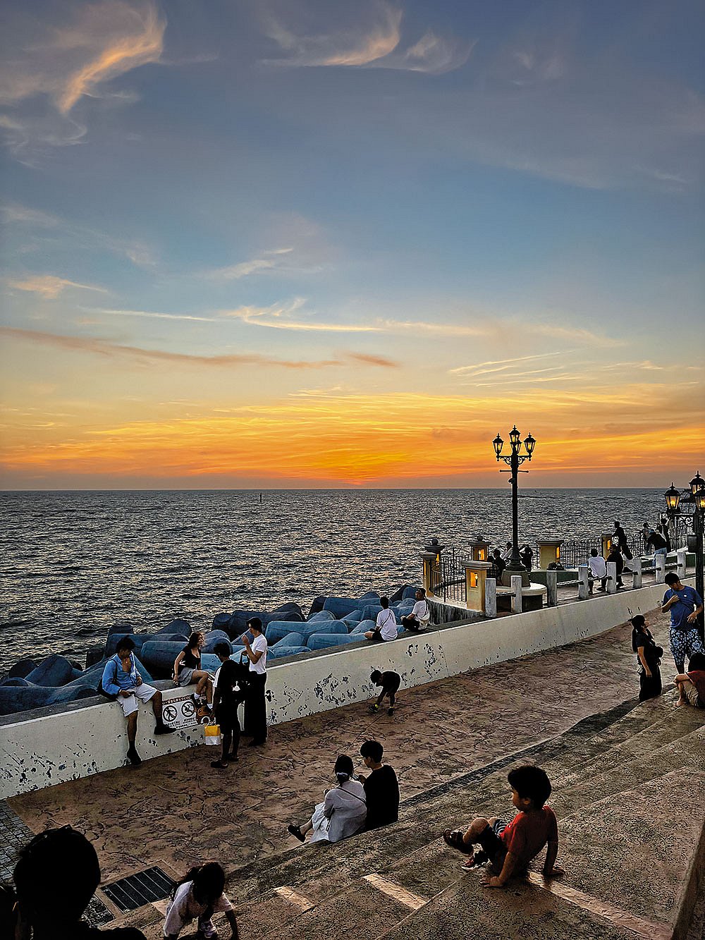 The promenade overlooking the East China Sea in Chatan during a beautiful sunset