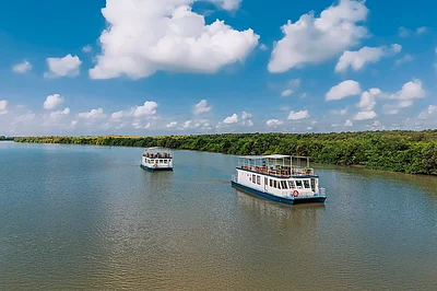Antara Cruises : An Antara Catamaran yacht on a river journey
