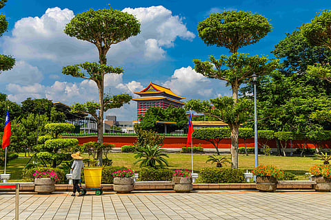 The Grand Hotel Taipei stands out with its ornate roofs, red columns and golden details