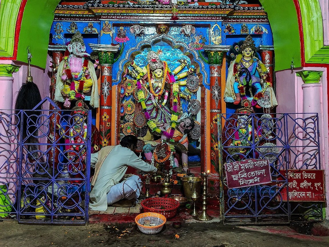 The principal idol of Maa Mrinmoyee remains inside the temple throughout the year, unlike Durga idols that are immersed after Dashami