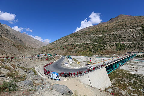 Pad Yatris seen crossing Darcha bridge over Bhaga river; the bridge is known to be the longest bridge in Lahaul region