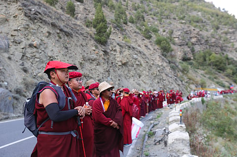 Gyalwa Dokhampa, a Drukpa Buddhist Master and author of the book, “The Restful Mind," who led the Pad Yatra along with two other Drukpa Buddhist Masters, Drupon Khamtak Rinpoche (second in line with red cap) and Somang Rinpoche ( third in line with beige hat)