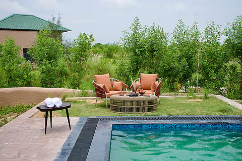 The resort's experiences include bush dinners, interactions with local artisans, and wellness therapies at Arama Spa