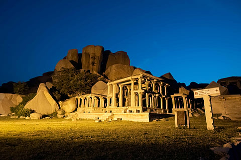 The monolithic Nandi at the eastern end of Hampi Bazaar