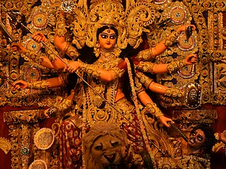 Unsplash : Delhi’s Durga Puja celebrations bring Bengali traditions, community gatherings, and festive food to neighbourhoods across the capital