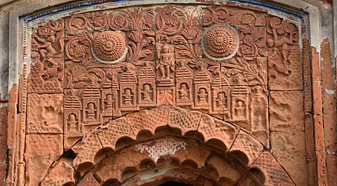Terracotta panels on arch of Aatchala temple in a cluster of three temples at Masagram of Purba Bardhaman district