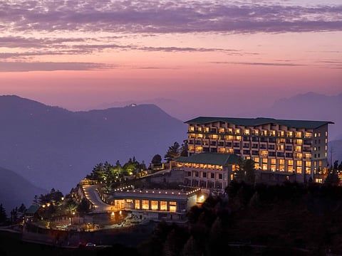 DusitD2 Fagu, Shimla, at dusk against the Himalayan hills