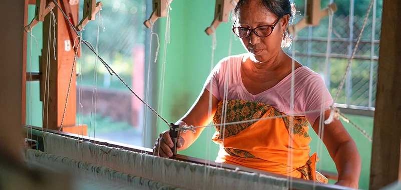 A Bodo woman weaving Eri silk at Bodoland Silk Park in Kokrajhar district of Bodoland Territorial Region.