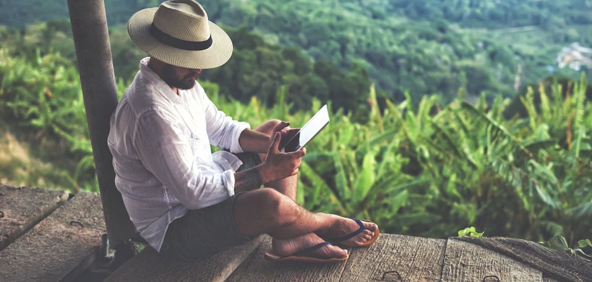 Reading travel books can sometimes be as transformative as the journey itself. Photo Credit Shutterstock