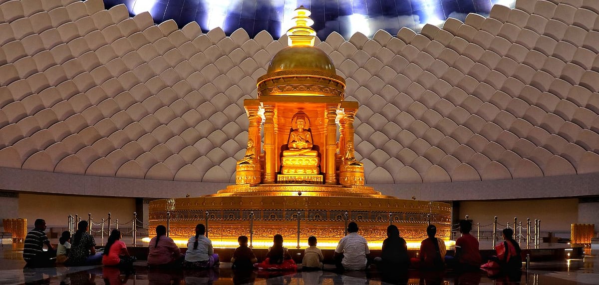 The Mahastupas interior is as beautiful as it gets, with a lotus flower-adorned ceiling and a 25-foot-high sky background