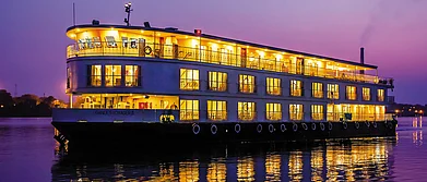 The Ganges Voyager cruise ship leaves the Botanical Garden Jetty
