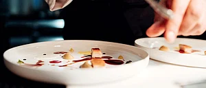 Final touches being put to a dish at Osteria Francescana in Italy