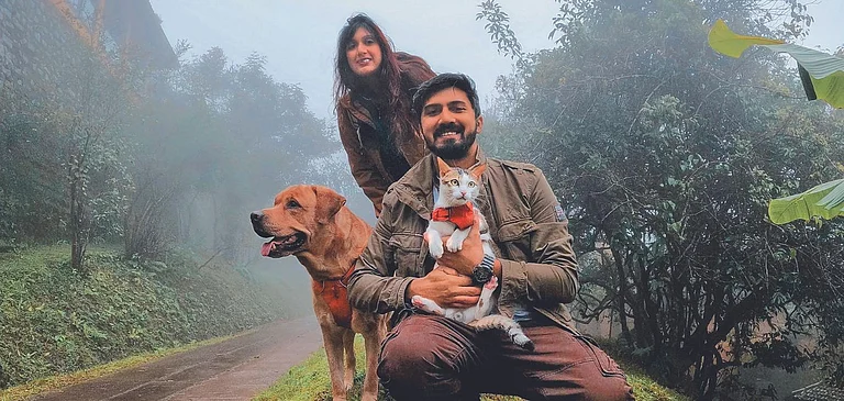 Priyanka and Tanveer with their furry friends. Credit Priyanka and Tanveer - null