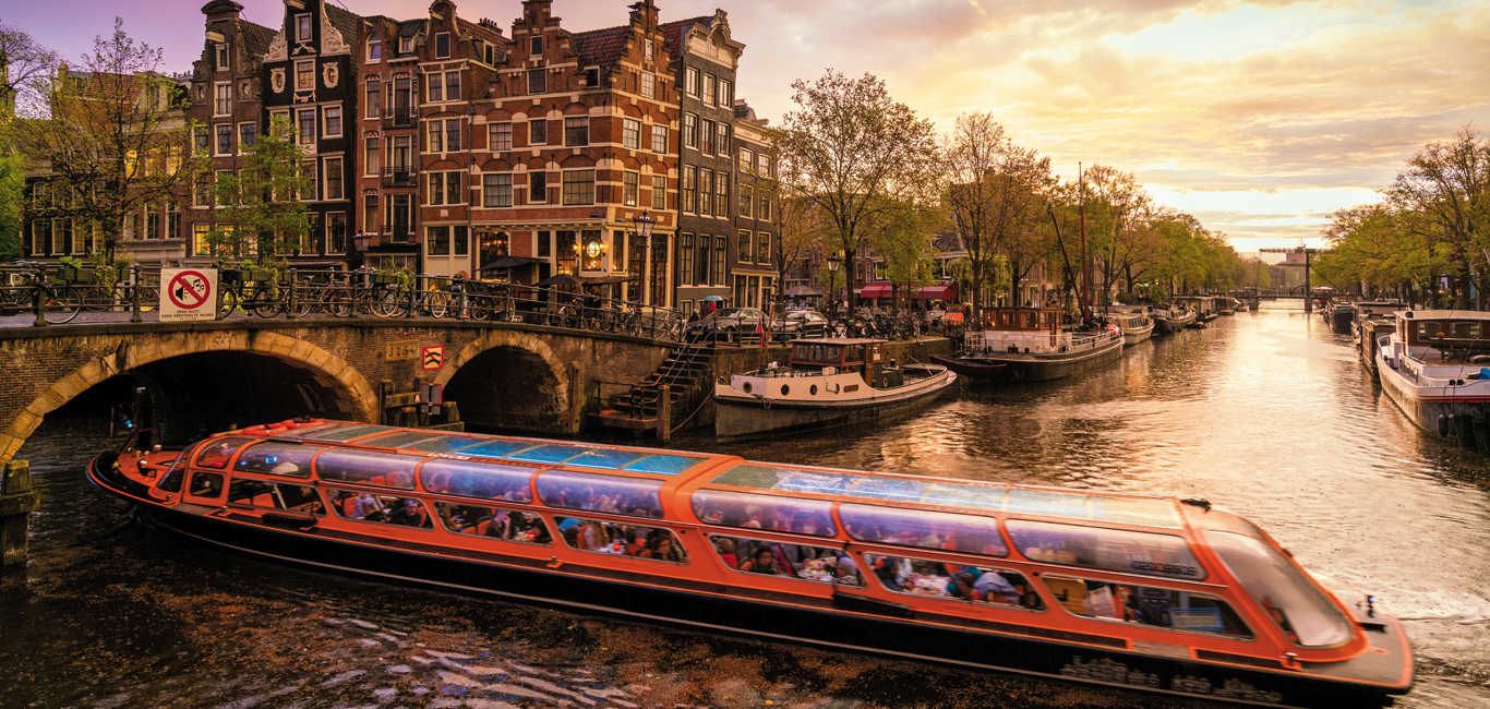 A view of Amsterdam's scenic canals at dusk