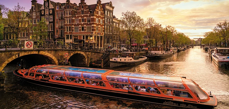 A view of Amsterdams scenic canals at dusk