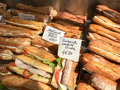 Fresh French baguettes for sale in a window in Paris, France Shutterstock