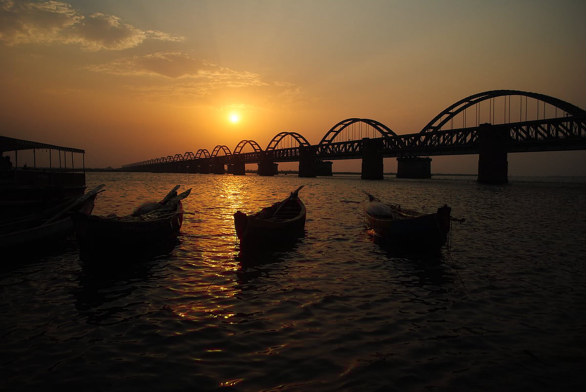 The sun sets over the Godavari Arch Bridge in Rajahmundry