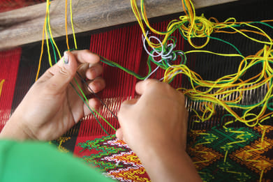 Shutterstock : Handloom weaving in progress