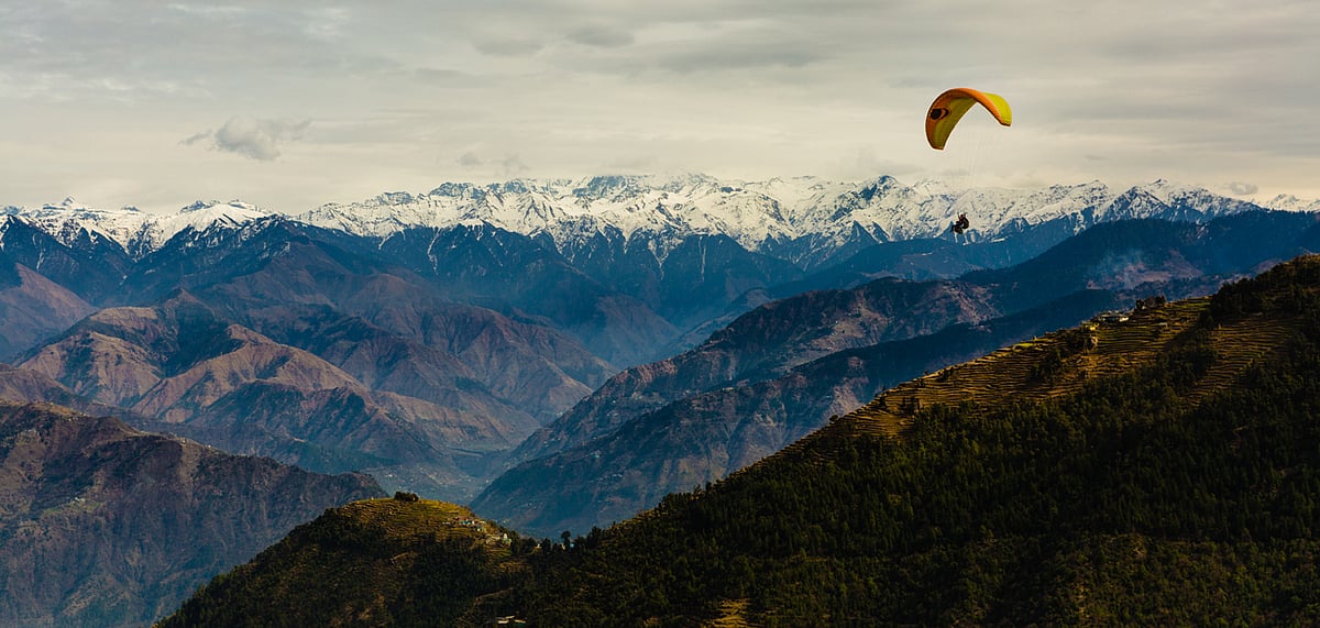 Para Gliding adventure at the valley of Khajjiar, Himachal Pradesh