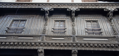 Intricately crafted wooden facade of an old Haveli in Gujarat