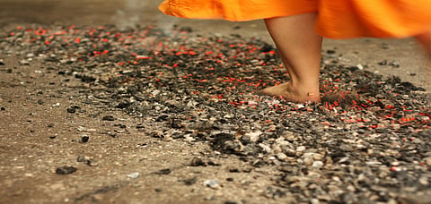 The ritual practice of walking over a coal pit