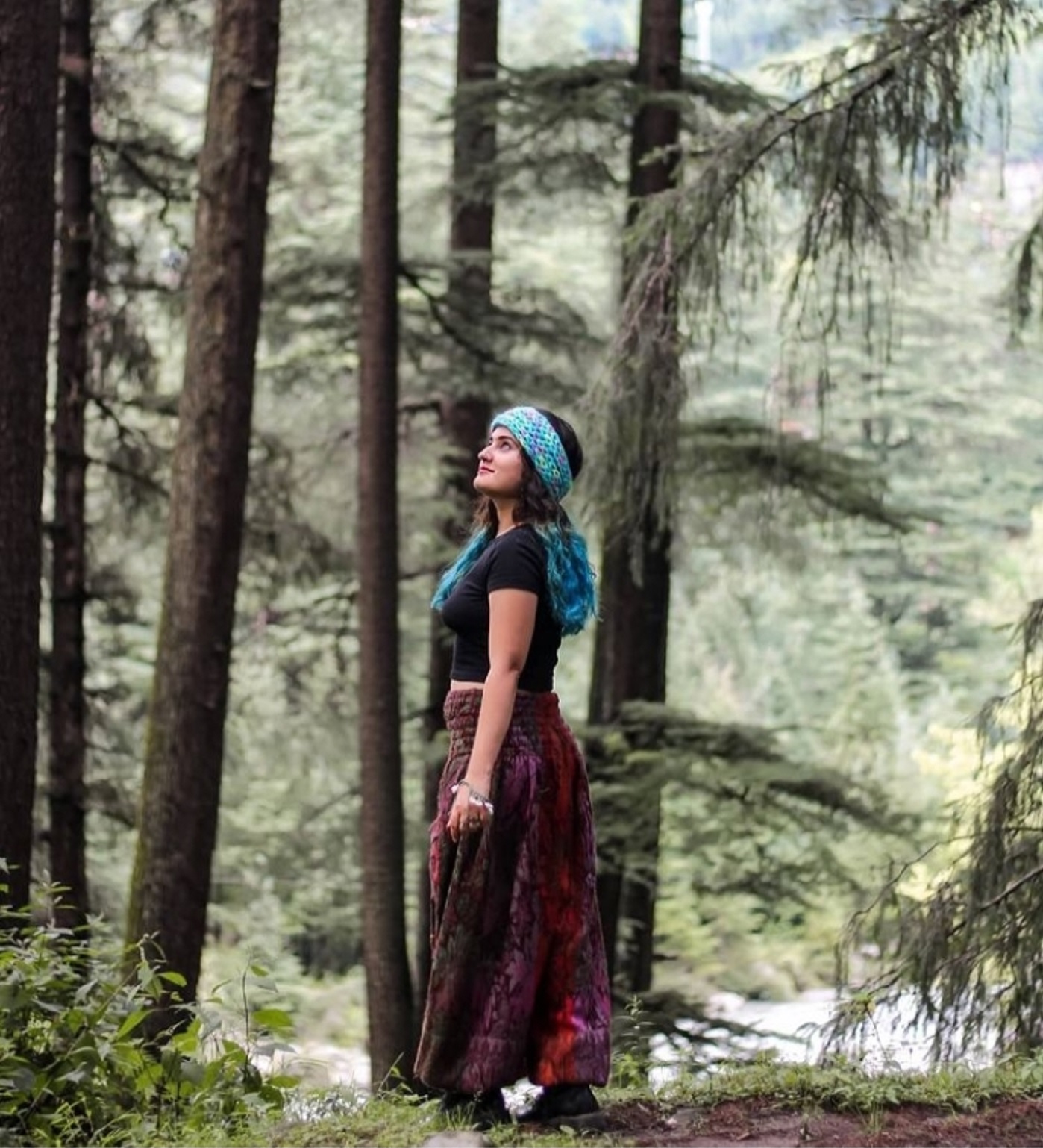 Swati gazes at the mountain forests