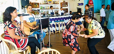 The crowd waltzing to the musicians ways at The Lazy Goose