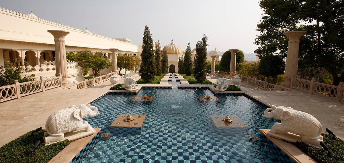 Landscaped gardens and reflection pools at The Oberoi Udaivilas