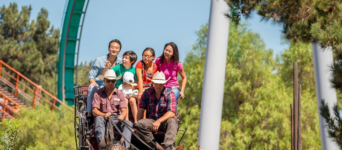 Photo Credits  Knotts Berry Farm Californias Best Amusement Park A family of four enjoys the ride on the Butterfield Stagecoach, Silver Bullet roller coaster. Credit Sean Arbabi