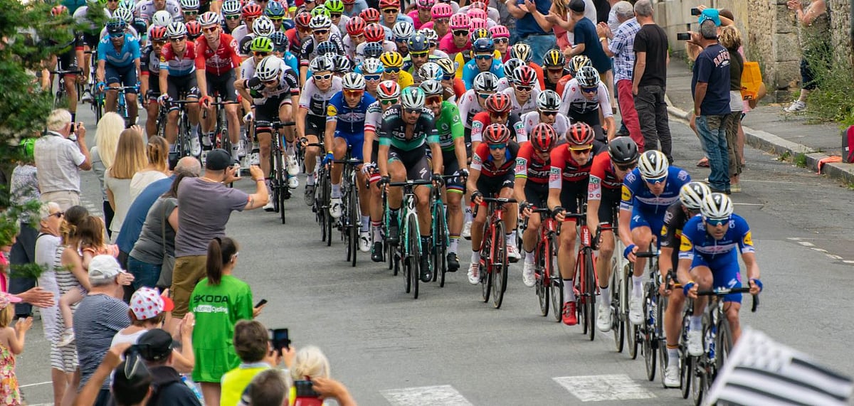 Shutterstock : Tour de France contestants passing through the village of Huelgoat in France