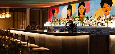 The colourful wall is the biggest draw of the place. Credit KHI KHI